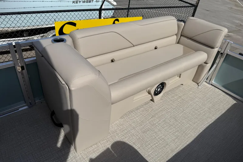 Slide: The Image of Luxurious seating on 2026 Avalon VENTURE QUAD LOUNGE pontoon boat, featuring beige upholstery. - 86