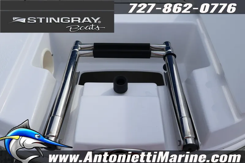 Slide: The Image of Stingray 211 DC boat ladder detail with contact information and logo. - 5