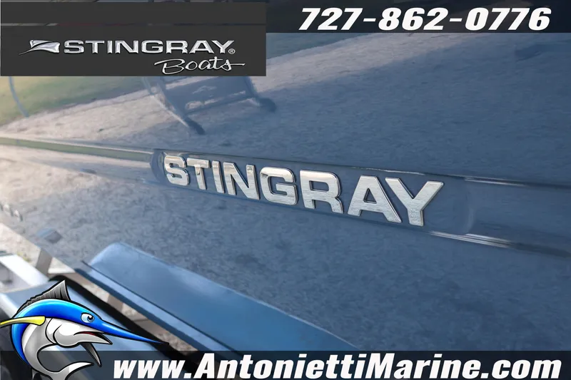 Slide: The Image of 2026 Stingray 211 DC boat logo with contact details and website for Antonietti Marine. - 6