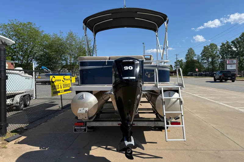 Slide: The Image of 2022 Tahoe Pontoon Sport Cruise with Mercury 90 engine at sales lot. - 10