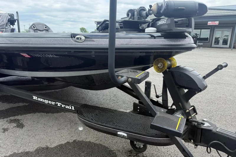 Slide: The Image of 2024 Ranger Z520R boat on Ranger Trail trailer, featuring Lowrance equipment. - 4