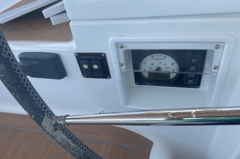 Slide: The Image of Control panel of a 2016 Lagoon 450 F yacht with steering wheel detail. - 22