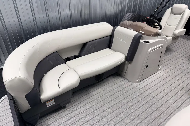 Slide: The Image of Luxurious seating on 2026 Sylvan Mirage 8520 Cruise PTS Tritoon boat interior. - 15