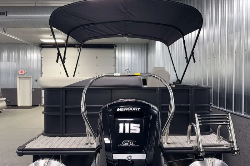 Slide: The Image of 2026 Sylvan Mirage 8520 Cruise PTS Tritoon with Mercury 115 engine in showroom. - 24