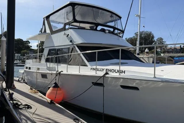 The Image of 1986 Fexas Custom 57 yacht docked at marina, named "Finally Enough." - 1