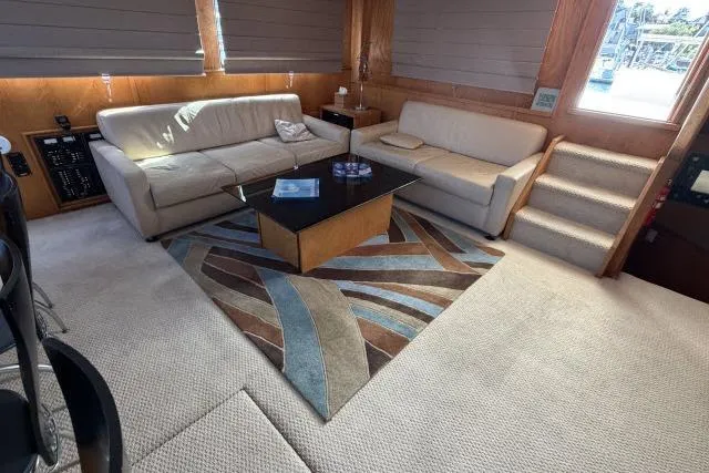 Slide: The Image of Luxurious interior of 1986 Fexas Custom 57 yacht with modern sofas and stylish decor. - 3