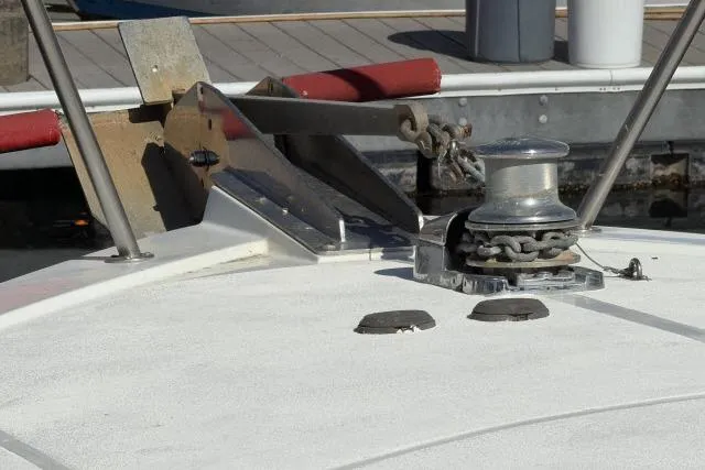 Slide: The Image of Bow of 1986 Fexas Custom 57 yacht with anchor and winch system. - 55