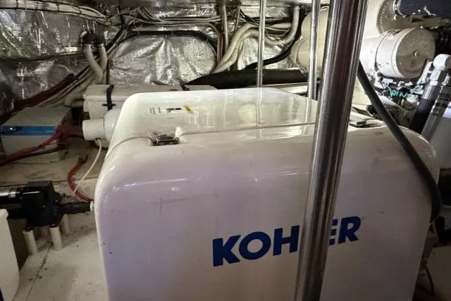 Slide: The Image of Engine room of 1986 Fexas Custom 57 with Kohler generator. - 60