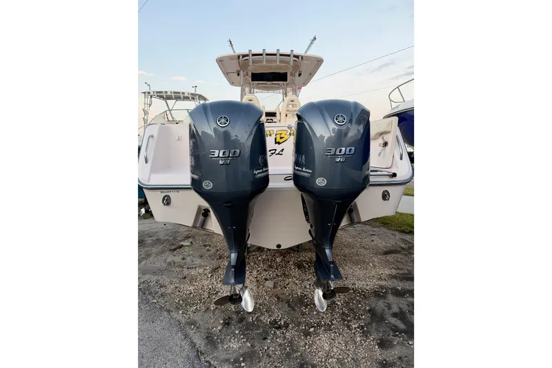 Slide: The Image of 2013 Grady-White Canyon 306 boat with twin Yamaha 300 V6 outboard engines. - 32