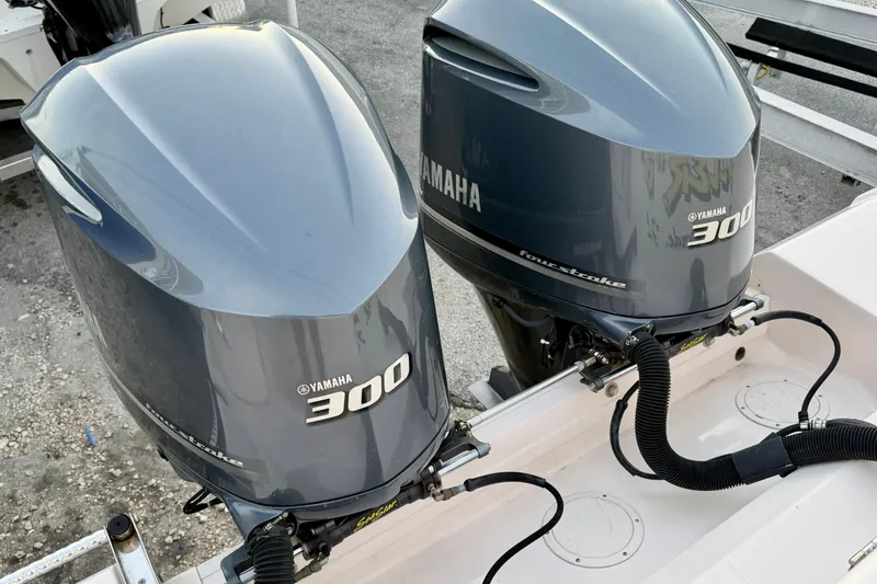 Slide: The Image of Twin Yamaha 300 outboard engines on a 2013 Grady-White Canyon 306 boat. - 33