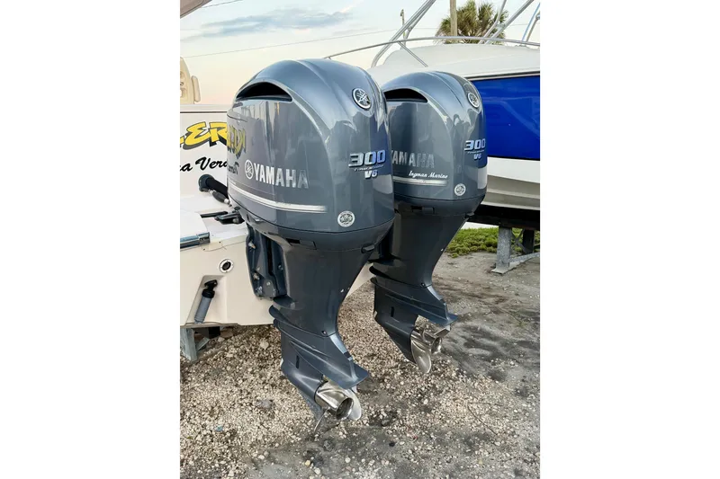 Slide: The Image of Twin Yamaha 300 V6 outboard engines on a 2013 Grady-White Canyon 306 boat. - 34