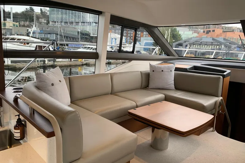 Slide: The Image of Luxurious interior of 2019 Princess F49 yacht with elegant seating and waterfront view. - 11