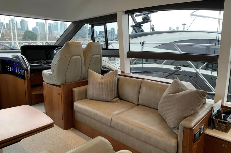 Slide: The Image of Luxurious interior of a 2019 Princess F49 yacht with city skyline view. - 12