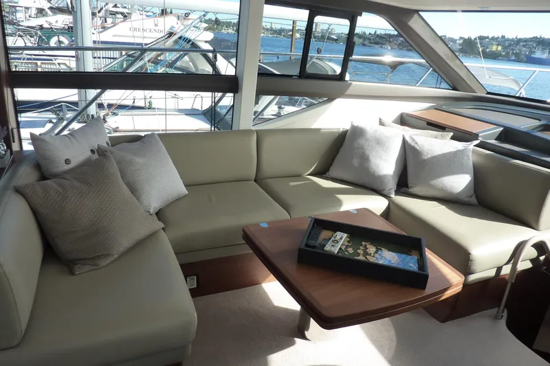 Slide: The Image of Luxurious interior of 2019 Princess F49 yacht with elegant seating and scenic water views. - 14