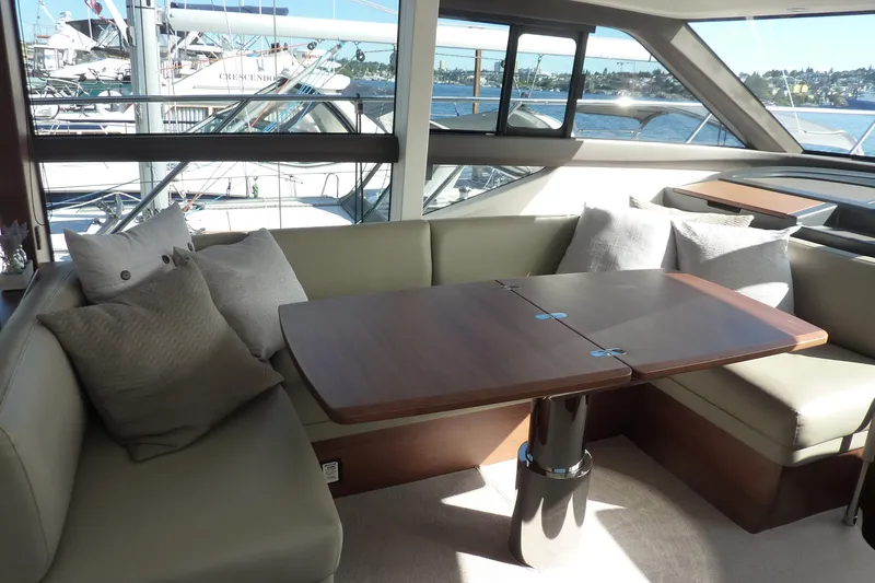Slide: The Image of Luxurious interior of 2019 Princess F49 yacht with elegant seating and wooden table. - 15