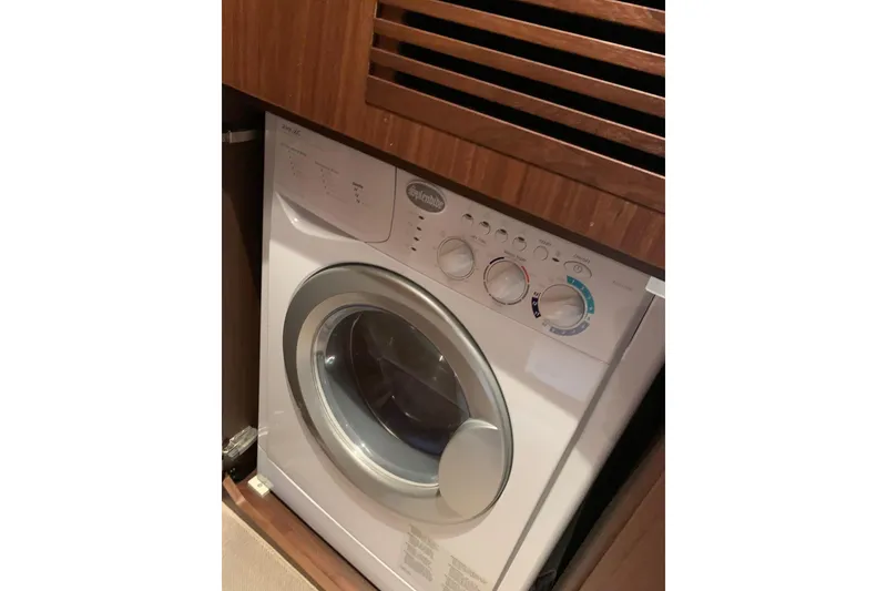 Slide: The Image of Front-loading washing machine in a wooden cabinet, Princess F49, 2019 model. - 30