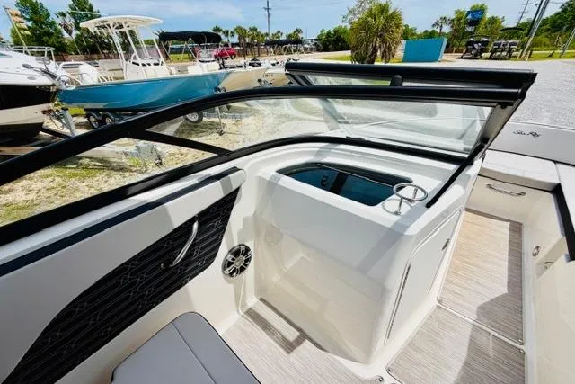 Slide: The Image of 2025 Sea Ray SPX 210 boat interior with sleek design and modern features. - 20