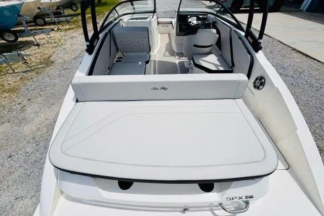 Slide: The Image of 2025 Sea Ray SPX 210 boat interior with sleek seating and modern design. - 8