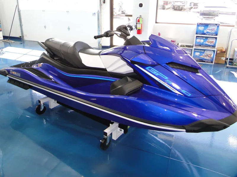 Slide: The Image of 2024 Yamaha Boats GP SVHO jet ski in showroom, blue color. - 5