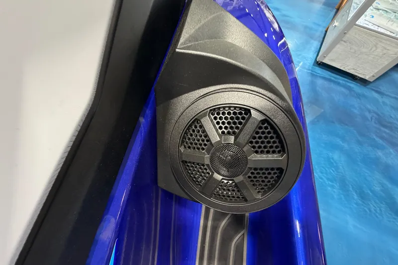 Slide: The Image of 2024 Yamaha WaveRunner GP1800R SVHO speaker detail on blue watercraft. - 6