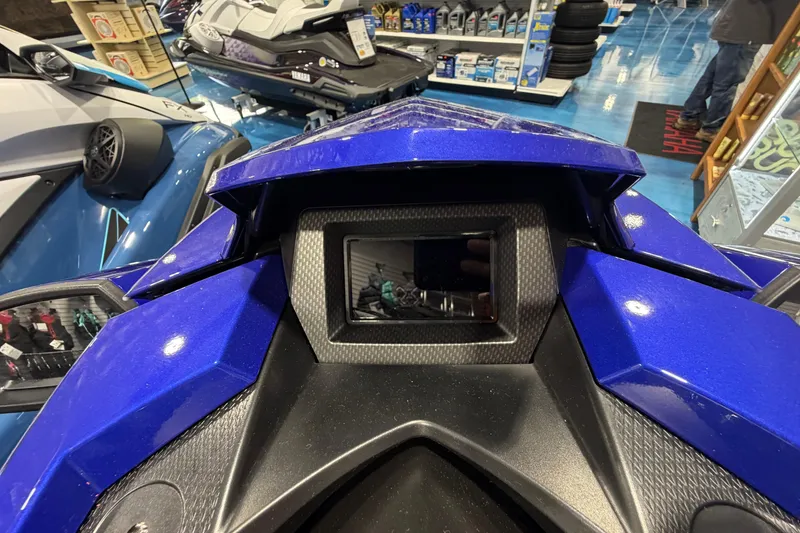 Slide: The Image of 2024 Yamaha WaveRunner GP1800R SVHO dashboard in a showroom setting. - 7