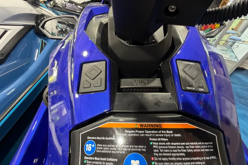 Slide: The Image of 2024 Yamaha WaveRunner GP1800R SVHO dashboard with control buttons and warning label. - 9