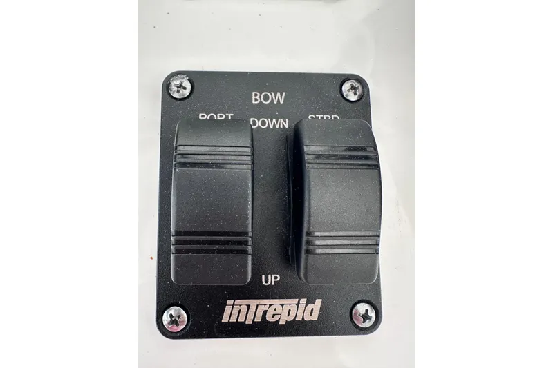 Slide: The Image of Control panel of 2024 Intrepid 41 Valor boat with labeled switches. - 18