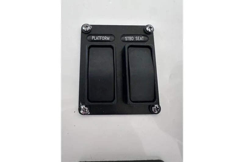 Slide: The Image of Control panel with switches labeled "Platform" and "STBD Seat" on 2024 Intrepid 41 Valor. - 19