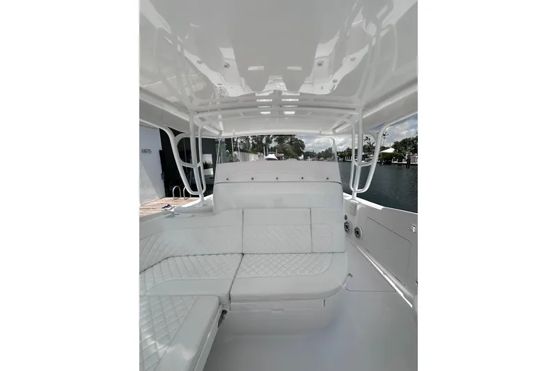 Slide: The Image of Luxurious interior of 2024 Intrepid 41 Valor boat with white seating and sleek design. - 29