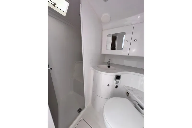 Slide: The Image of Luxurious bathroom in 2024 Intrepid 41 Valor yacht, featuring modern fixtures and sleek design. - 39