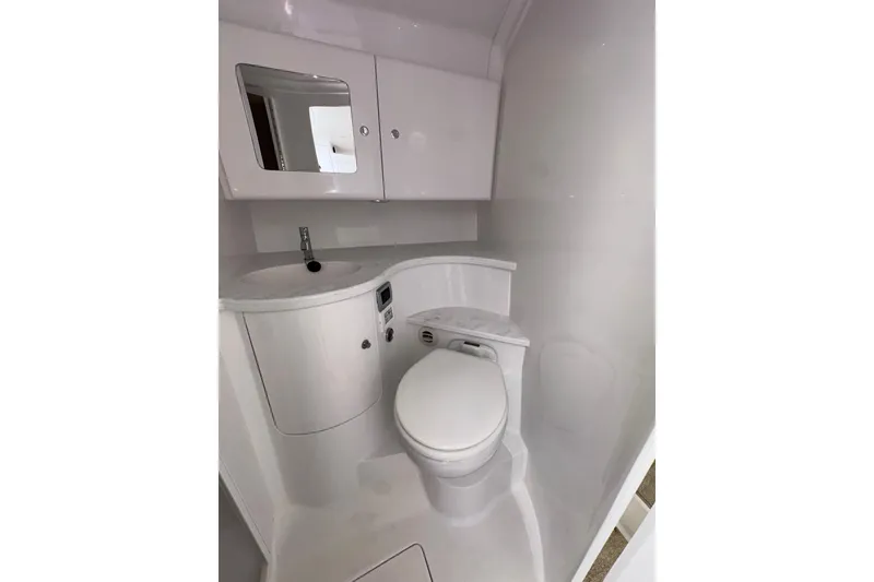 Slide: The Image of Modern bathroom interior of 2024 Intrepid 41 Valor boat, featuring sleek design and compact fixtures. - 40