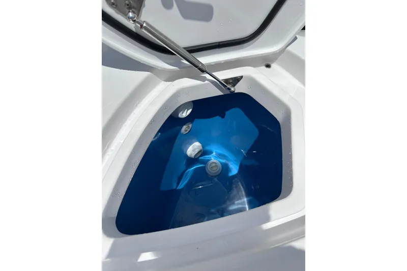 Slide: The Image of Livewell compartment on 2024 Intrepid 41 Valor boat, filled with water. - 61