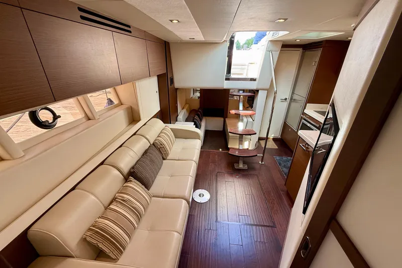 Slide: The Image of Luxurious interior of 2012 Sea Ray 410 Sundancer yacht with elegant seating and modern design. - 43
