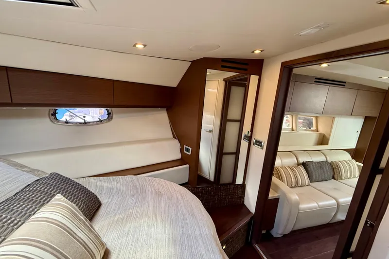 Slide: The Image of Luxurious interior of 2012 Sea Ray 410 Sundancer yacht with cozy seating and elegant design. - 45