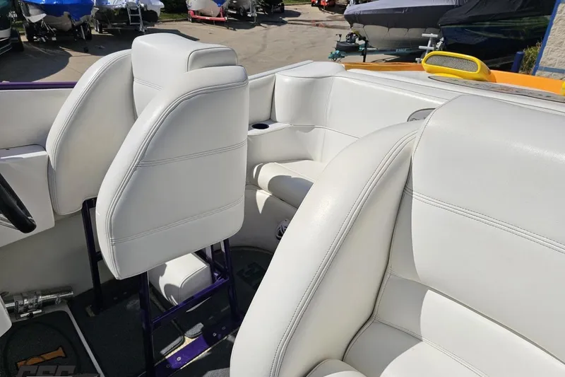 Slide: The Image of Interior of a 2001 Cigarette 42' Tiger boat with white leather seating. - 101