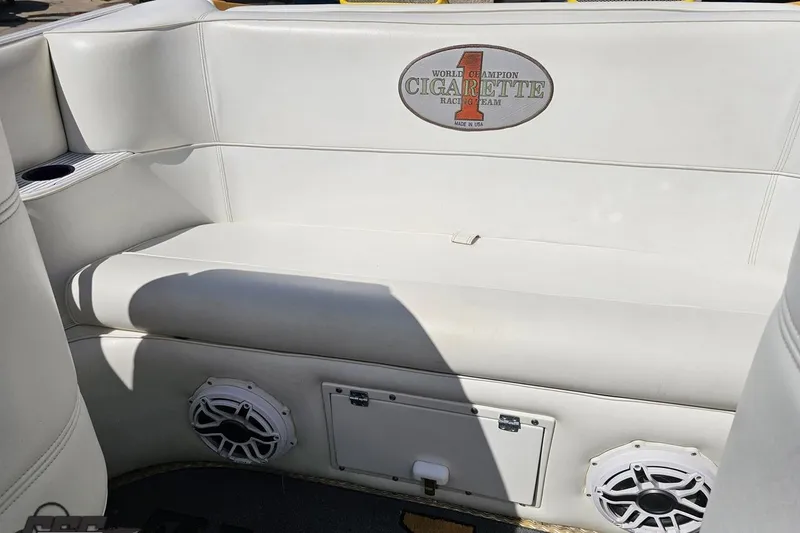 Slide: The Image of Interior seating of a 2001 Cigarette 42' Tiger boat with branded upholstery. - 102