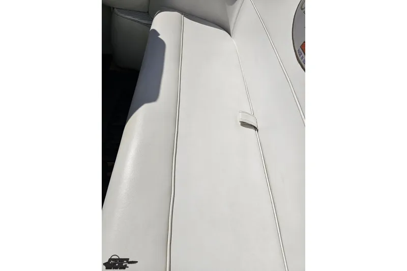 Slide: The Image of White leather seating on a 2001 Cigarette 42' Tiger boat interior. - 108
