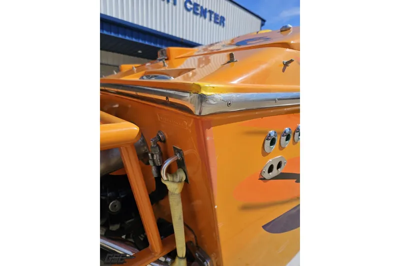 Slide: The Image of Orange 2001 Cigarette 42' Tiger boat detail with chrome accents and hardware. - 121