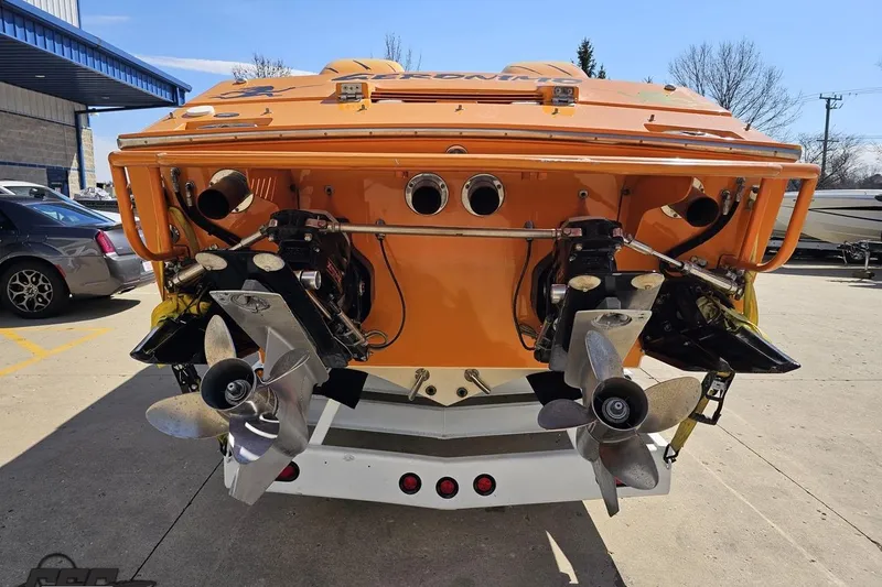 Slide: The Image of Rear view of a 2001 Cigarette 42' Tiger boat with dual propellers. - 39