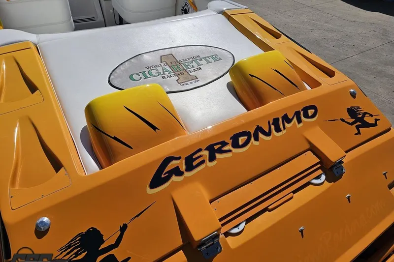 Slide: The Image of 2001 Cigarette 42' Tiger boat, yellow with "Geronimo" text and racing graphics. - 45