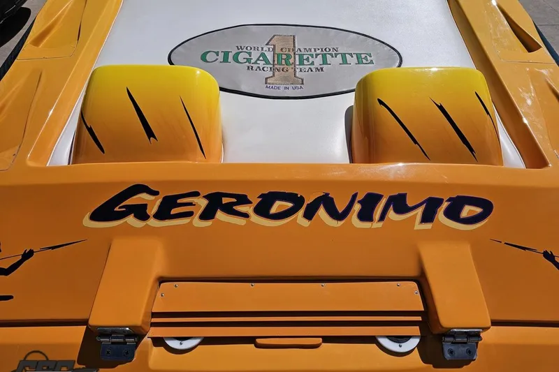 Slide: The Image of Orange 2001 Cigarette 42' Tiger boat with "Geronimo" and racing team logo. - 47