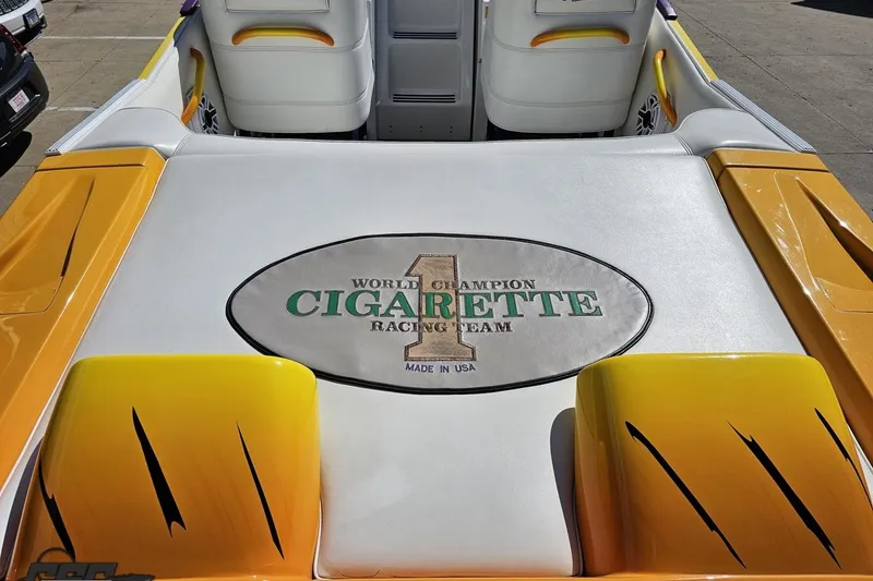 Slide: The Image of 2001 Cigarette 42' Tiger boat interior with "World Champion Cigarette Racing Team" logo. - 51