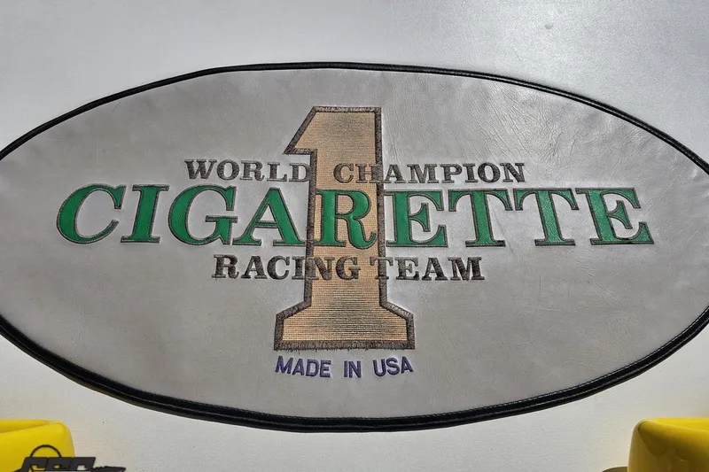 Slide: The Image of World Champion Cigarette Racing Team logo on a 2001 Cigarette 42' Tiger boat. - 54