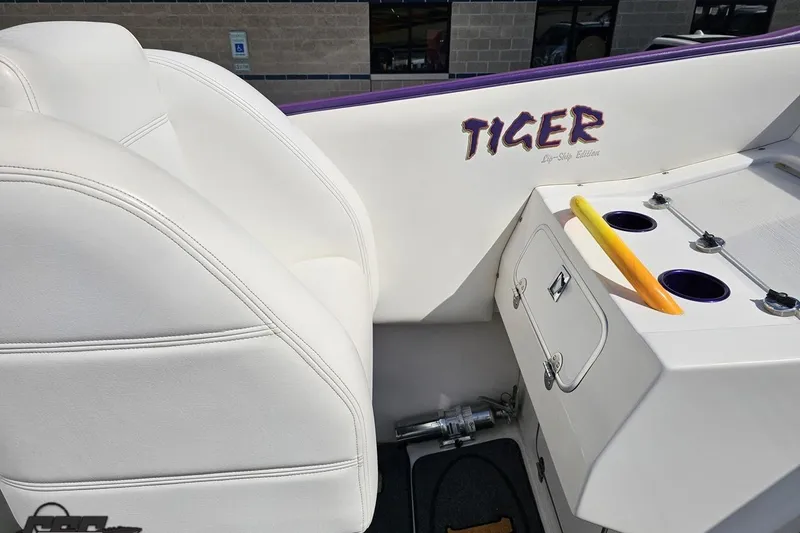 Slide: The Image of Interior of 2001 Cigarette 42' Tiger boat with white seating and "Tiger" branding. - 63