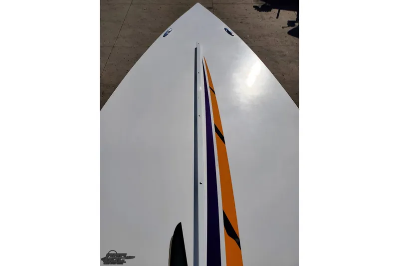Slide: The Image of 2001 Cigarette 42' Tiger boat with sleek design and vibrant stripes. - 79