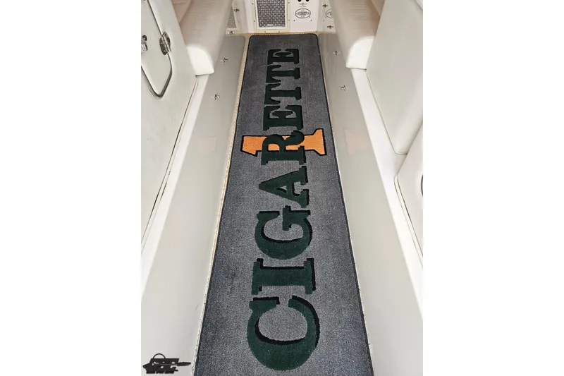 Slide: The Image of 2001 Cigarette 42' Tiger boat interior with branded carpet. - 83
