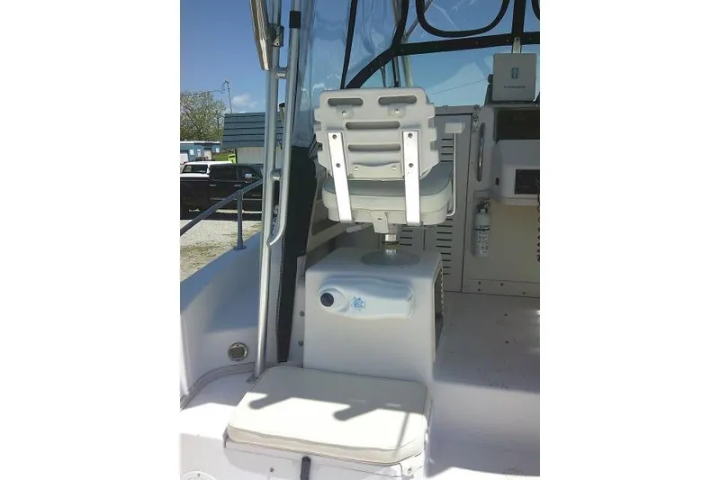 Slide: The Image of 2000 Grady-White Sailfish 272 boat interior with seating and control panel. - 20