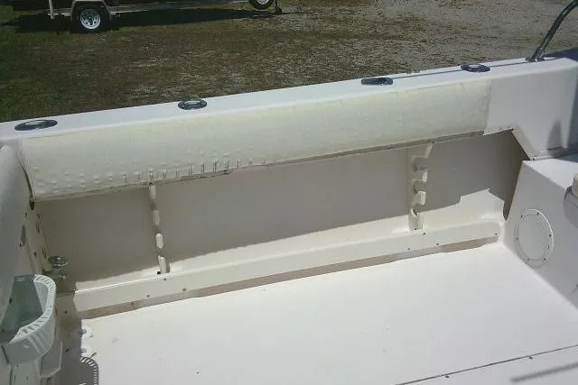 Slide: The Image of 2000 Grady-White Sailfish 272 boat interior, featuring a clean, spacious deck area. - 22