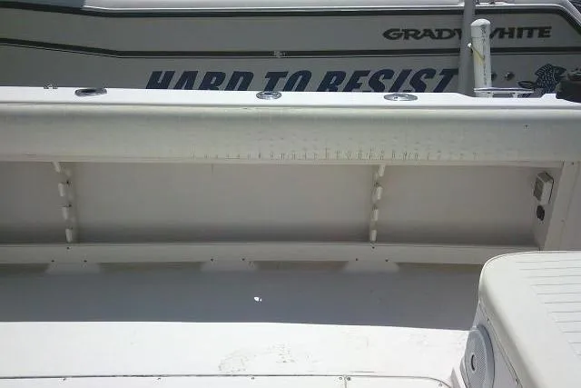 Slide: The Image of 2000 Grady-White Sailfish 272 boat deck with storage compartment. - 23