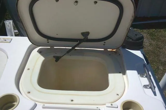 Slide: The Image of Open storage compartment on a 2000 Grady-White Sailfish 272 boat. - 24